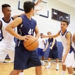 Teenagers Playing Basketball